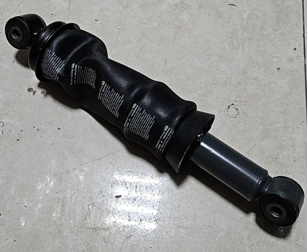 картинка Амортизатор кабины пневматический задний  HOWO A7 AZ1664440069 от магазина Dulan.tj